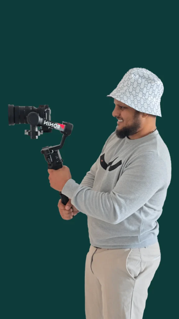 Andy Kozman, real estate videographer, filming with a gimbal camera